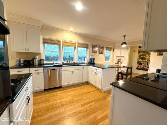 Dining room, Interior, Kitchen, Pendant Lights, Recessed Lighting, Stainless Steel Appliances, Wood Texture Flooring