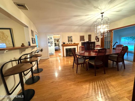 Chandelier, Dining room, Fireplace, Interior, Wood Texture Flooring