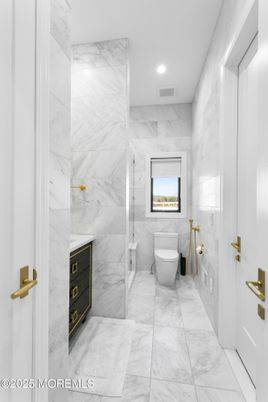 Bathroom, Free Standing Baths, Glass Shower, Interior, Marble, Marble Walls, Recessed Lighting