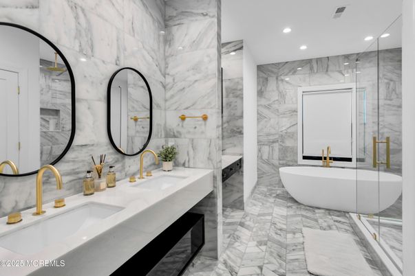 Bathroom, Dual Sink Vanities, Free Standing Baths, Glass Shower, Interior, Marble, Marble Walls, Recessed Lighting