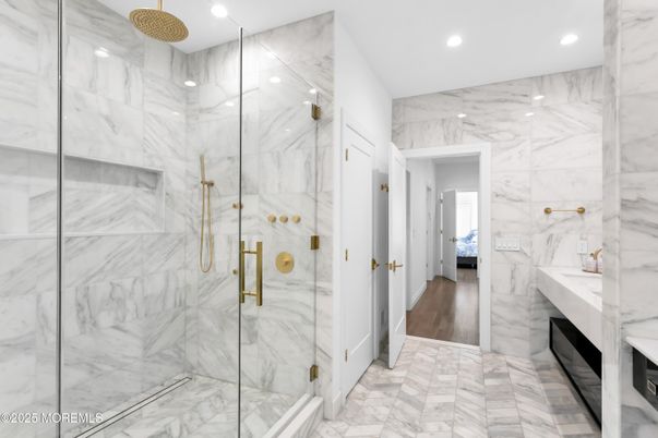 Bathroom, Glass Shower, Interior, Marble, Marble Walls, Recessed Lighting, Wood Texture Flooring