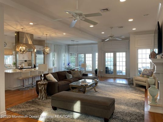 Chandelier, Dining room, Fireplace, Interior, Kitchen, Living room, Pendant Lights, Recessed Lighting, Wood Texture Flooring