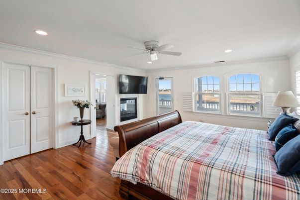 Bedroom, Fireplace, Interior, Recessed Lighting, Wood Texture Flooring