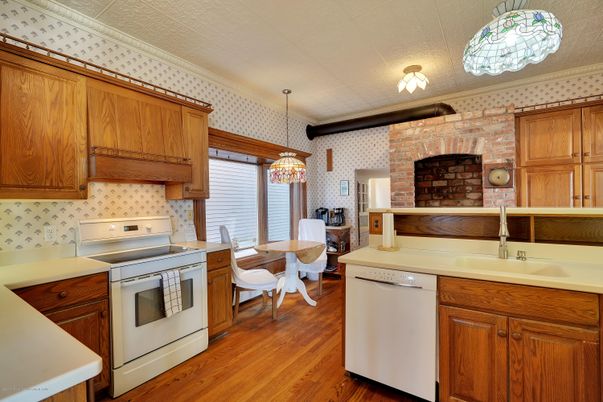 Dining room, Fireplace, Interior, Kitchen, Pendant Lights, Stone Walls, Wood Texture Flooring