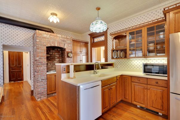 Fireplace, Interior, Kitchen, Pendant Lights, Stone Walls, Wood Texture Flooring