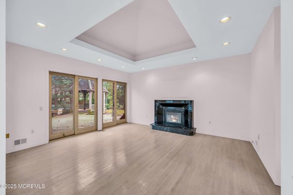 Empty room, Fireplace, Interior, Recessed Lighting, Wood Texture Flooring