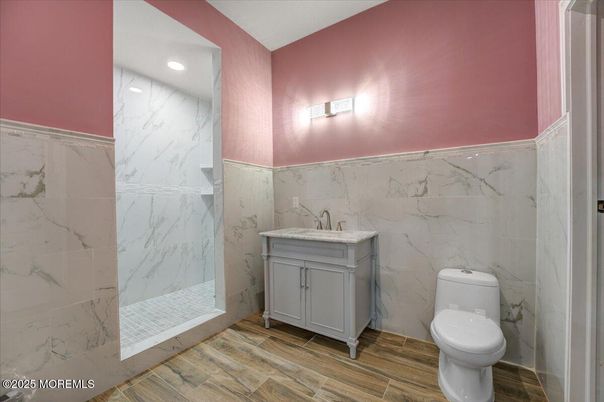 Bathroom, Interior, Marble Walls, Recessed Lighting, Wood Texture Flooring