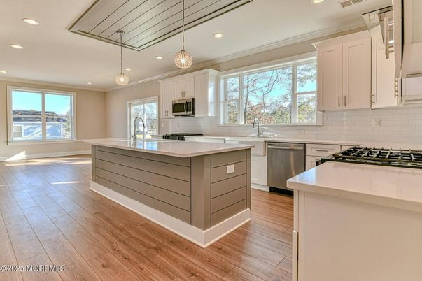 Interior, Kitchen, Pendant Lights, Recessed Lighting, Stainless Steel Appliances, Wood Texture Flooring