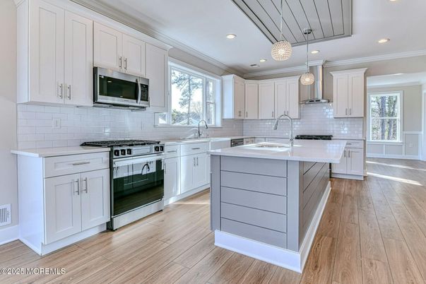 Interior, Kitchen, Pendant Lights, Recessed Lighting, Stainless Steel Appliances, Wood Texture Flooring