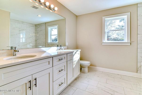 Bathroom, Dual Sink Vanities, Interior, Marble, Marble Walls, Recessed Lighting