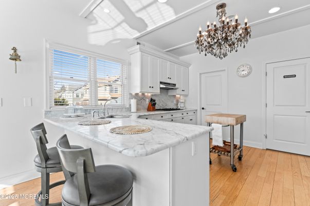 Chandelier, Interior, Kitchen, Recessed Lighting, Stainless Steel Appliances, Wood Texture Flooring