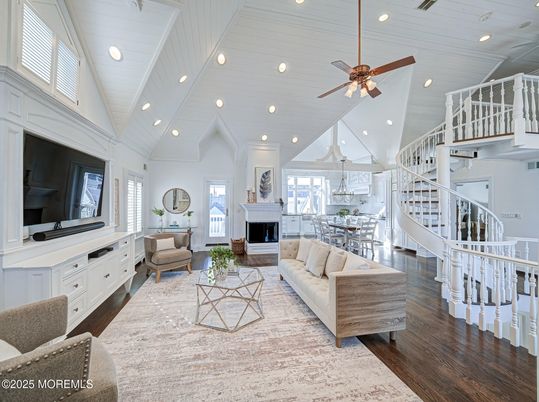 Dining room, Fireplace, Interior, Living room, Recessed Lighting, Wood Texture Flooring