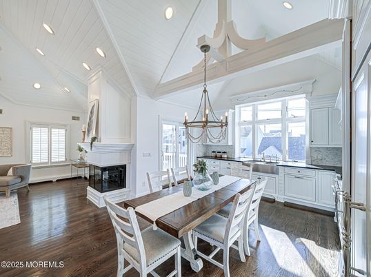 Chandelier, Dining room, Fireplace, Interior, Kitchen, Pendant Lights, Recessed Lighting, Wood Texture Flooring