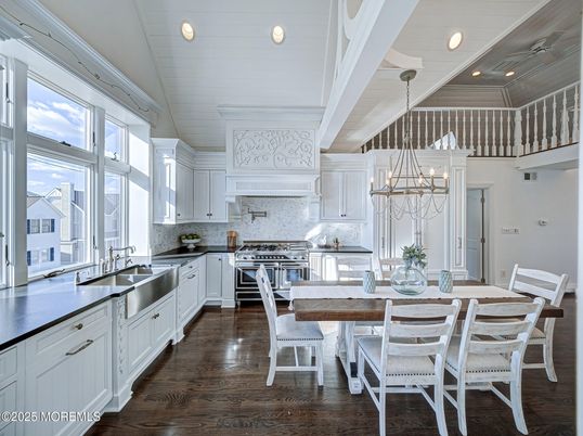 Dining room, Interior, Kitchen, Pendant Lights, Recessed Lighting, Stainless Steel Appliances, Wood Texture Flooring