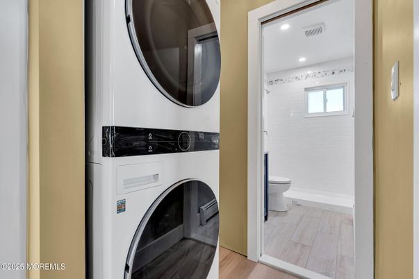 Bathroom, Interior, Recessed Lighting, Utility Closets, Washer, Wood Texture Flooring