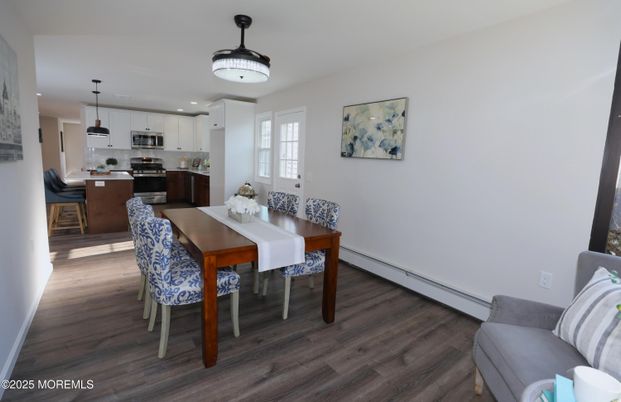 Dining room, Interior, Kitchen, Pendant Lights, Recessed Lighting, Stainless Steel Appliances, Wood Texture Flooring