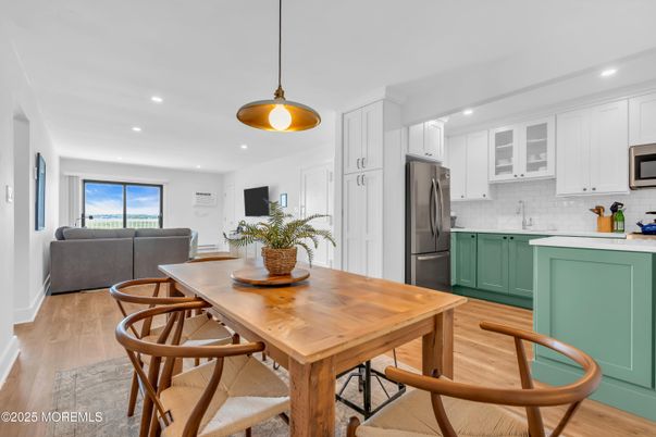 Dining room, Interior, Kitchen, Pendant Lights, Recessed Lighting, Stainless Steel Appliances, Wood Texture Flooring