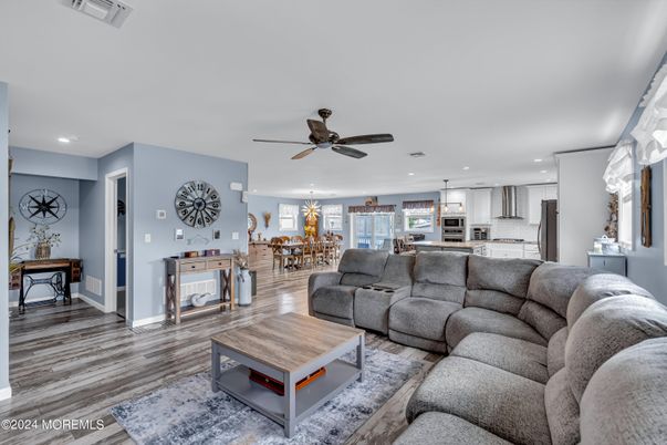 Dining room, Interior, Kitchen, Living room, Pendant Lights, Recessed Lighting, Stainless Steel Appliances, Wood Texture Flooring