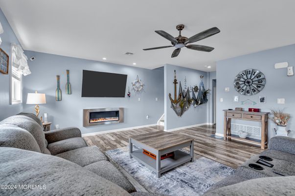 Fireplace, Interior, Living room, Recessed Lighting, Wood Texture Flooring