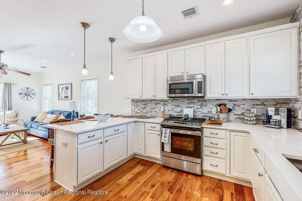 Interior, Kitchen, Pendant Lights, Recessed Lighting, Stainless Steel Appliances, Wood Texture Flooring