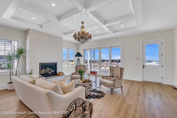 Chandelier, Fireplace, Interior, Living room, Recessed Lighting, Wood Texture Flooring