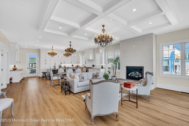Chandelier, Dining room, Fireplace, Interior, Kitchen, Living room, Recessed Lighting, Wood Texture Flooring
