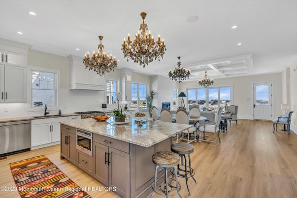 Chandelier, Dining room, Interior, Kitchen, Recessed Lighting, Stainless Steel Appliances, Wood Texture Flooring
