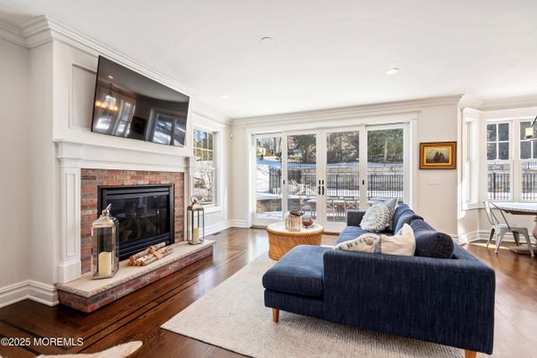 Dining room, Fireplace, Interior, Living room, Recessed Lighting, Wood Texture Flooring