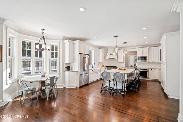 Dining room, Interior, Kitchen, Pendant Lights, Recessed Lighting, Stainless Steel Appliances, Wood Texture Flooring