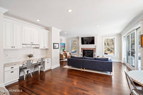 Dining room, Fireplace, Interior, Living room, Recessed Lighting, Wood Texture Flooring