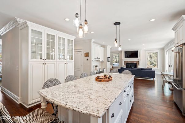 Fireplace, Interior, Kitchen, Living room, Pendant Lights, Recessed Lighting, Stainless Steel Appliances, Wood Texture Flooring