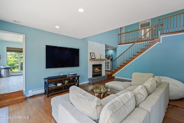 Fireplace, Interior, Living room, Recessed Lighting, Wood Texture Flooring