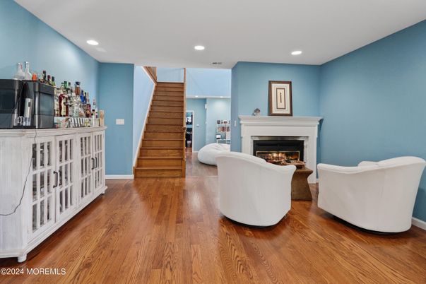 Fireplace, Interior, Living room, Recessed Lighting, Wood Texture Flooring