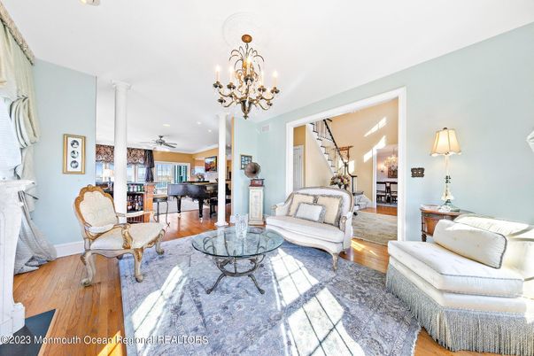 Chandelier, Interior, Living room, Piano, Recessed Lighting, Wood Texture Flooring