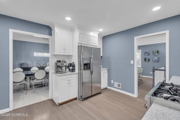 Dining room, Interior, Kitchen, Recessed Lighting, Stainless Steel Appliances, Wood Texture Flooring