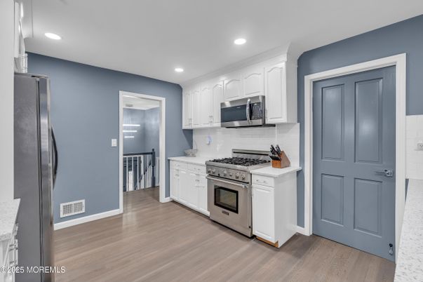 Interior, Kitchen, Recessed Lighting, Stainless Steel Appliances, Wood Texture Flooring