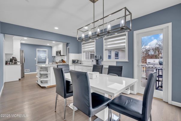 Dining room, Interior, Kitchen, Pendant Lights, Recessed Lighting, Stainless Steel Appliances, Wood Texture Flooring