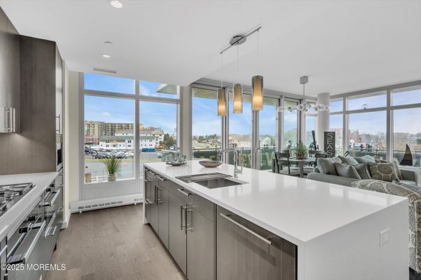 Dining room, Interior, Kitchen, Living room, Pendant Lights, Recessed Lighting, Stainless Steel Appliances, Wood Texture Flooring