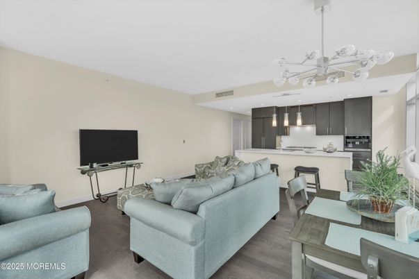 Dining room, Interior, Kitchen, Living room, Pendant Lights, Recessed Lighting, Stainless Steel Appliances, Wood Texture Flooring