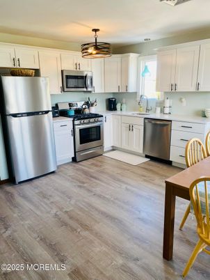 Interior, Kitchen, Pendant Lights, Stainless Steel Appliances, Wood Texture Flooring