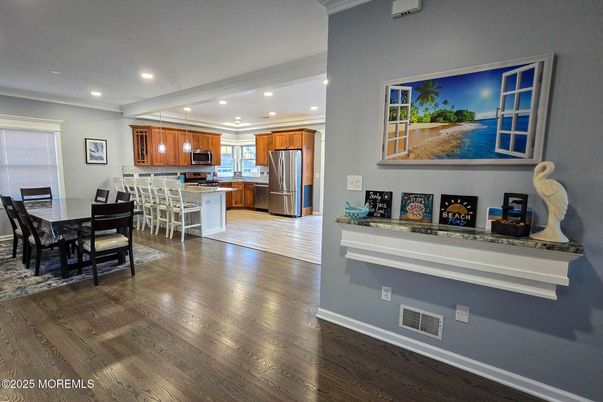 Dining room, Interior, Kitchen, Pendant Lights, Recessed Lighting, Stainless Steel Appliances, Wood Texture Flooring