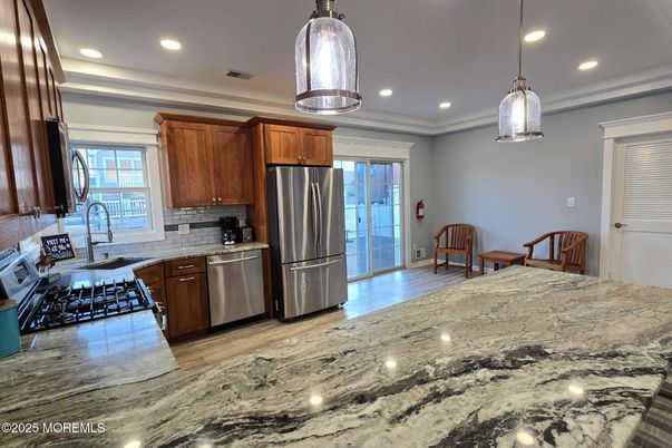 Interior, Kitchen, Pendant Lights, Recessed Lighting, Stainless Steel Appliances, Wood Texture Flooring