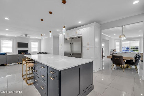 Dining room, Fireplace, Interior, Kitchen, Living room, Pendant Lights, Recessed Lighting, Stainless Steel Appliances