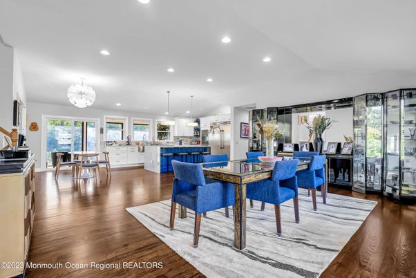 Chandelier, Dining room, Interior, Kitchen, Pendant Lights, Piano, Recessed Lighting, Wood Texture Flooring