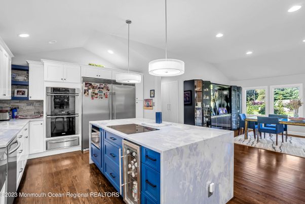 Dining room, Interior, Kitchen, Pendant Lights, Recessed Lighting, Stainless Steel Appliances, Wood Texture Flooring