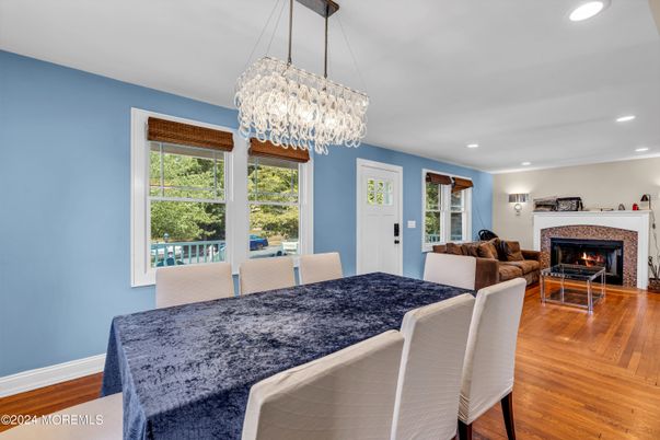 Chandelier, Dining room, Fireplace, Interior, Living room, Recessed Lighting, Wood Texture Flooring