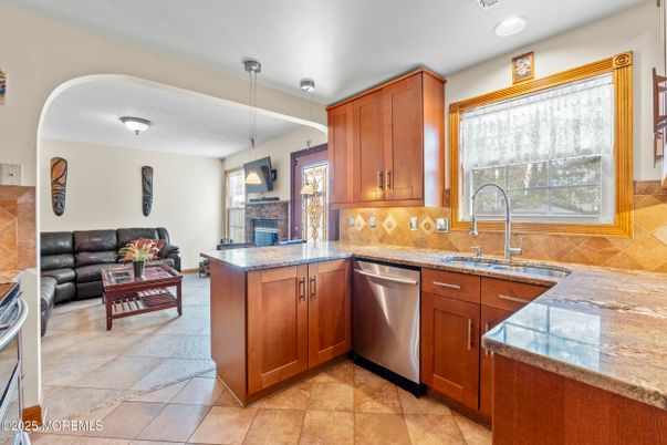 Fireplace, Interior, Kitchen, Living room, Pendant Lights, Recessed Lighting, Stainless Steel Appliances
