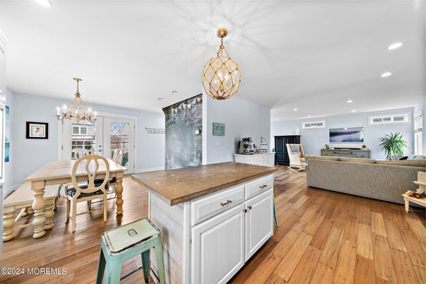 Chandelier, Dining room, Interior, Living room, Recessed Lighting, Wood Texture Flooring