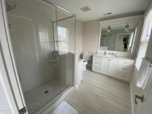 Bathroom, Dual Sink Vanities, Glass Shower, Interior, Wood Texture Flooring