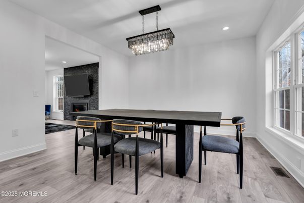 Chandelier, Dining room, Fireplace, Interior, Recessed Lighting, Wood Texture Flooring